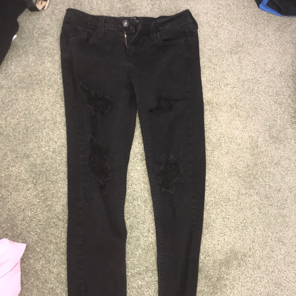 Black ripped skinny low waisted jeans